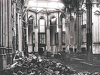 Interior of the church showing debris after the 1908 destruction, highlighting the enduring legacy of the Amsterdam miracle.