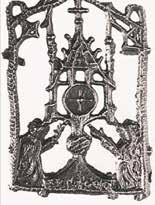A sculpture depicting a religious monument with figures on either side.
