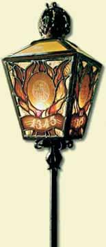 Stained glass lamp inscribed with '1345,' used in the 'Stille Omgang' procession commemorating the Miracle of Amsterdam.