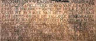 An inscription detailing historical information related to the Eucharistic Miracle of Amsterdam.