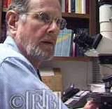 Dr. Robert Lawrence examines the Buenos Aires miracle sample, identifying it as skin with white blood cells, March 2000.