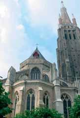 A view of the Church of the Most Precious Blood in Bruges, showcasing its architectural details.