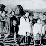 A group of people in historical attire walking in a procession, led by a priest holding a lantern.
