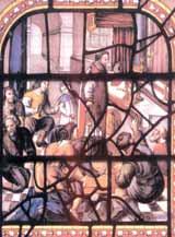 A stained glass window illustrating the Eucharistic miracle with people in prayer and worship.