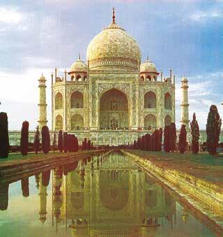 A photograph of the Taj Mahal with its reflection in the water.