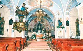 Interior of the shrine where the 1411 Ludbreg miracle occurred, featuring ornate decorations and a central altar.