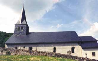 The Parish of Blanot, with its slate roof and spire, is where the 1331 Eucharistic Miracle occurred.