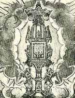 An ornate reliquary designed to hold the Sacred Host, featuring angels and decorative elements.