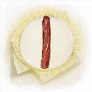 An image of a Eucharistic Host transformed into bleeding Flesh, displayed in a decorative setting.