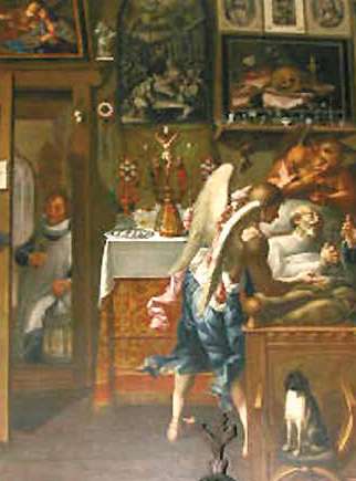An ornate altar with statues and gold decorations inside a church.