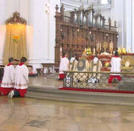 Altar scene with clergy in red and white vestments during a religious ceremony.