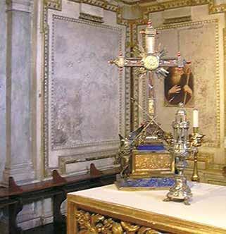 Golden cross on altar at Weingarten, preserving the Holy Blood relic, a significant Eucharistic artifact from 1094.