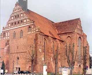The Church of St. Nicholas in Wilsnack, rebuilt in Gothic style, commemorates the 1383 Eucharistic miracle of the bleeding Hosts.