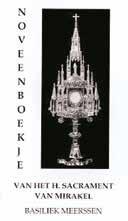 A decorative image of a monstrance used for the Eucharist.