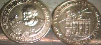 Medallion with the image of Pope Gregory IX with the Bull, the façade of the cathedral with the Host above