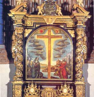Ornate altar with a cross and figures, linked to the 1535 Eucharistic miracle at San Secondo, Asti.