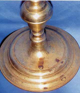 The base of a chalice showing stains, possibly related to a Eucharistic miracle.