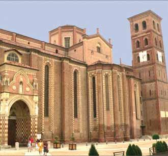 Exterior view of the Cathedral of Asti, showcasing its architectural features and surrounding area.