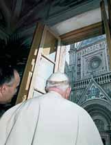John Paul II looking out of a window towards the Orvieto Cathedral.