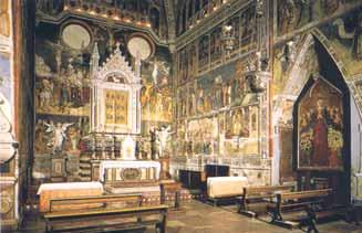 Interior view of the Orvieto Cathedral showcasing its ornate architecture and religious art.