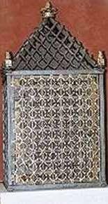 A decorative reliquary containing the Host and coagulated Blood from the miracle.