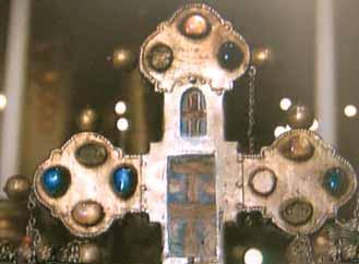 Enlarged image of the relics contained in a precious cross, made by a Venetian craftsman in the 13th century.