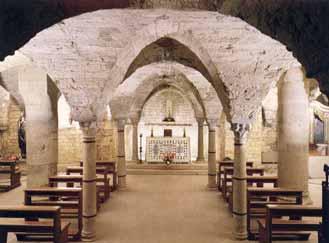 The crypt of Rosano monastery, where the Sacred Heart statue reportedly bled and wept, features ancient stone arches.