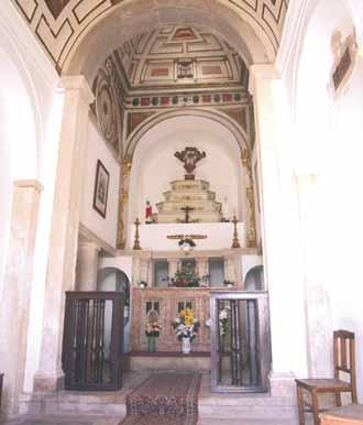 Interior of Santarem chapel where the stolen Hosts were miraculously returned, featuring an ornate altar and religious decor.