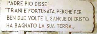 A quote from Padre Pio about the significance of Trani's Eucharistic miracles.