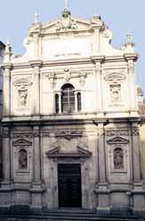 Image of a church facade with ornate decorations and statues.