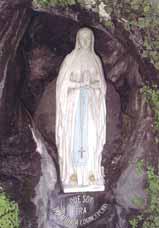 Statue of Our Lady in the grotto where she appeared to Bernadette