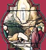 Stained glass depiction of a religious scene with figures in prayer and a divine figure above.