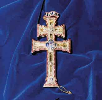 The Cross of Caravaca, adorned with jewels, symbolizes the miraculous event leading to conversions in 1231 Spain.