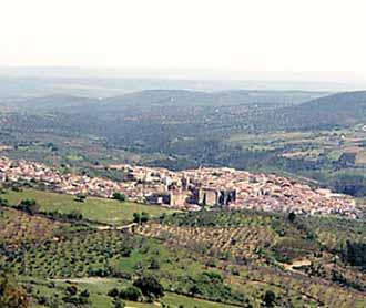 Panoramic view of Guadalupe, Spain, highlighting the town's historical significance as a pilgrimage site for the 1420 miracle.