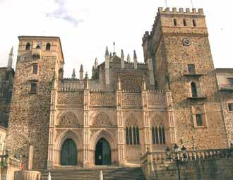 A stone church with towers and gothic architectural elements.