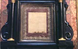 A framed relic displaying the blood-stained corporal from the Eucharistic miracle.