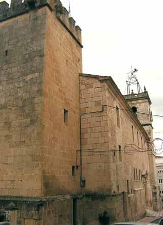The image shows the exterior of St. James Church with its stone walls and tower.