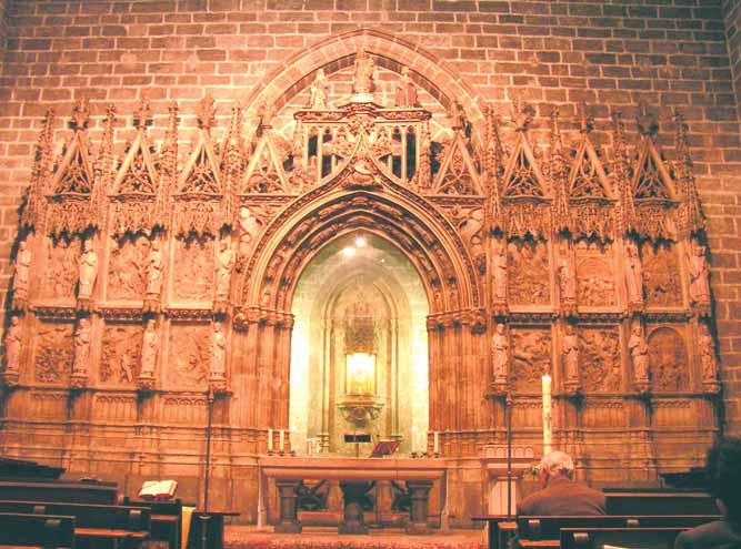 The image shows a detailed altar with intricate carvings and a candlelit setting.