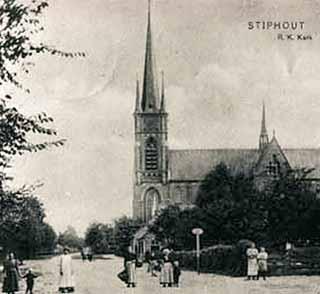 A historical image of Saint Trudo's Church in Stiphout, showing its tall spire and surrounding trees.